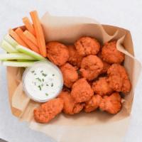 12 Crispy Boneless Wings Combo · 12 Crispy boneless chicken wings tossed with up to 2 wing flavors and served with fresh carr...