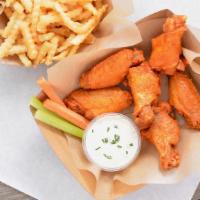 #3. Six Bone In Wing Combo · Served with carrot & celery sticks, fries and dipping sauce.