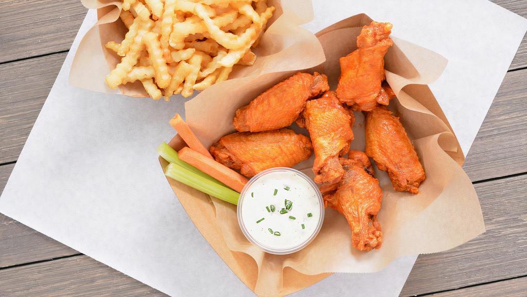 6 Classic Bone-In Wings Combo · 6 Classic bone-in chicken wings tossed with 1 wing flavor and served with fresh carrot & celery sticks and homemade buttermilk ranch or blue cheese dressing + Fries