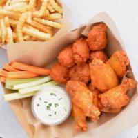 12 Crispy Boneless Wings Combo · 12 Crispy boneless chicken wings tossed with up to 2 wing flavors and served with fresh carr...