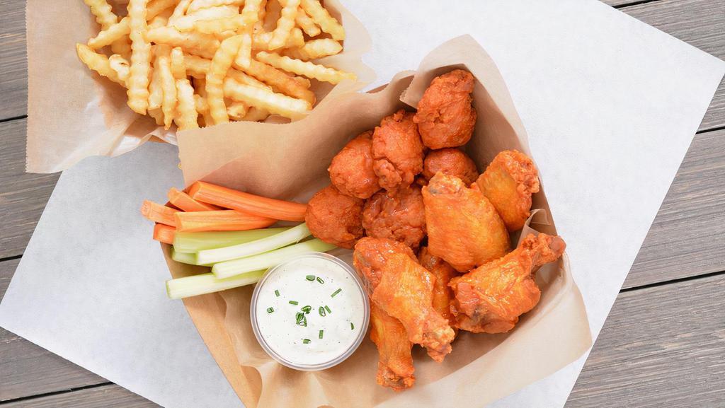 6 Classic Bone-In Wings + 6 Crispy Boneless Wings Combo · 6 Classic bone-in chicken wings and 6 crispy boneless wings tossed with up to 2 wing flavors and served with fresh carrot & celery sticks and homemade buttermilk ranch or blue cheese dressing + Fries