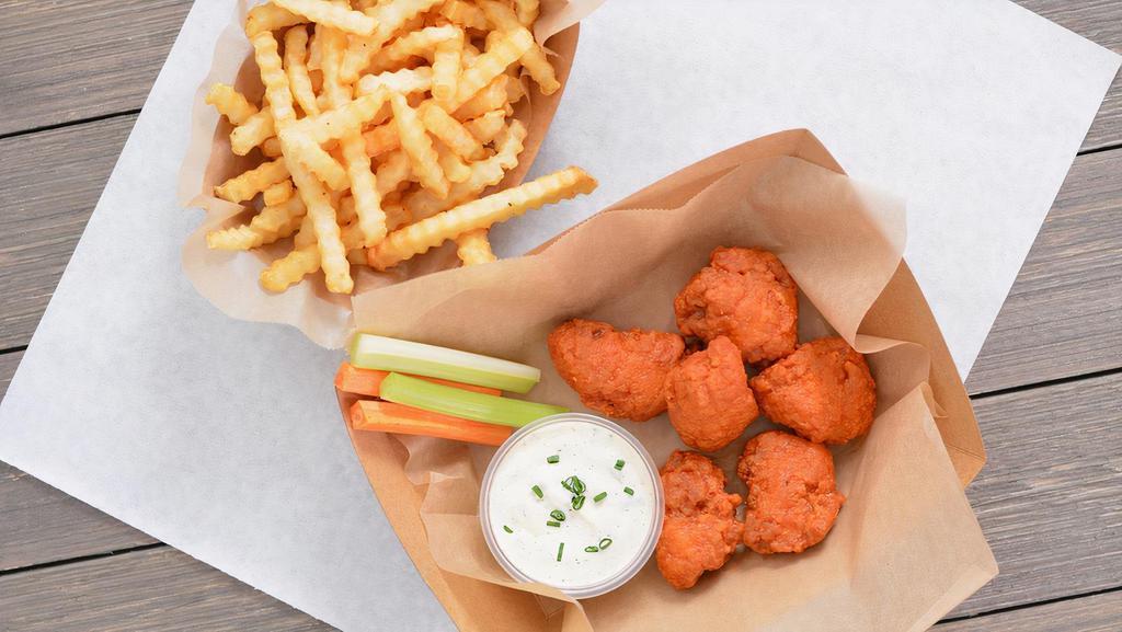 6 Crispy Boneless Wings Combo · 6 Crispy boneless chicken wings tossed in 1 wing flavor and served with fresh carrot & celery sticks and homemade buttermilk ranch or blue cheese dressing + Fries
