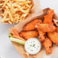 #4. Eight Bone In Wing Combo · Served with carrot & celery sticks, fries and dipping sauce.