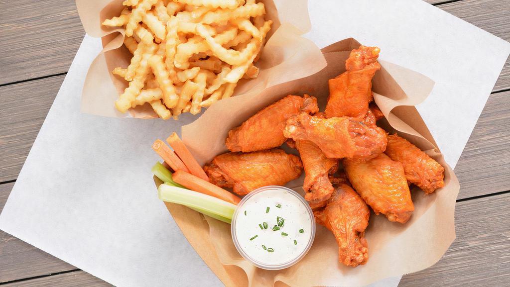 8 Classic Bone-In Wings Combo · 8 Classic bone-in chicken wings tossed with 1 wing flavor and served with fresh carrot & celery sticks and homemade buttermilk ranch or blue cheese dressing + Fries.