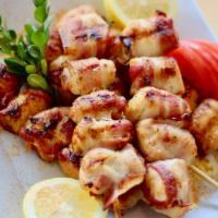 Chicken-Bacon Skewerd · Individual skewer served with tzatziki or Niko's sauce and pita bread.
