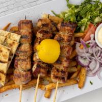 Chicken Bacon Skewers Platter · Three bacon wrapped cubed marinated chicken skewers.