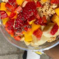 Açaí Almond Butter Bowl · Ingredients: açaí, strawberries, banana, granola, mango, almond butter, almonds, chia seed.