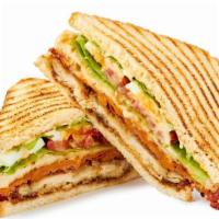 Golden Gate Club Sandwich · Sandwich with turkey, bacon, fresh lettuce, tomatoes, and mayo on toast.