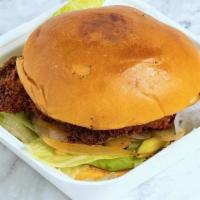 Crispy Chicken Burger · Breaded Crispy Chicken, Lettuce, Tomato, Pickles, Caramelized Onions, and barbecue sauce on ...