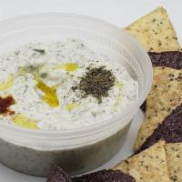 Tzatziki Mezze · Strained yogurth grated cucumbers, garlic, olive oil, salt, dried mint
With tortilla chips