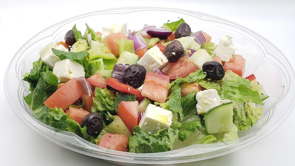 Greek Salad  · Lettuce, tomatoes, cucumber, bell pepper, red onion, olives, feta cheese, oregano, with lemon olive oil dressing