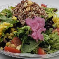 Quinoa Salad · Mix green, quinoa, tomatoes, sweet corn, pickled red onion, peanut and avocado puree