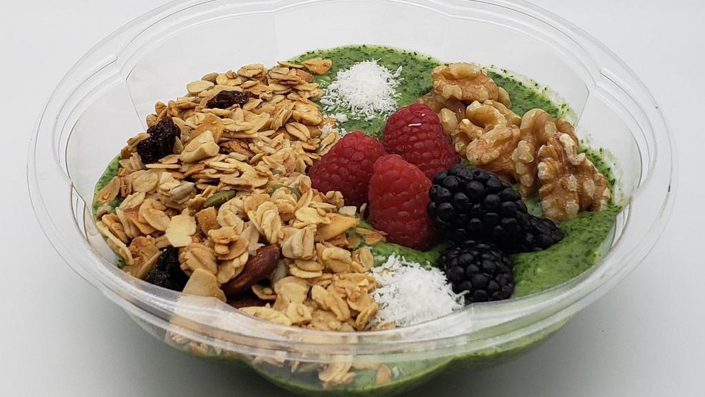 Green Smoothie Bowl  · Almond milk, avocado, spinach, banana, pineapple, coconut flakes, granola sprinkles, berries and walnut