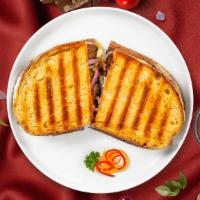 Fatality Combo Panini · Pastrami, corned beef, provolone sheese, lettuce, tomato, mustard and honey dressing. Served...