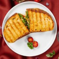 Manipesto O'Cluck Panini · Chicken, melted cheese, pesto, lettuce and tomato served on your choice of toasted bread.