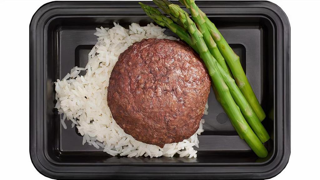 Grass-Fed Post Workout · Dairy-free, gluten-free. A lean grass-fed beef patty served with a side of white rice and steamed asparagus.