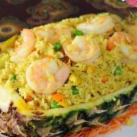 Pineapple Fried Rice · Fried rice with raisin, pineapple and egg
choice of seafood, shrimp, chicken, veg. Or beef.