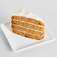 Classic Carrot Cake (Slice) · Layers if incredibly moist carrot cake studded with raisins, walnuts, and pineapple, topped ...