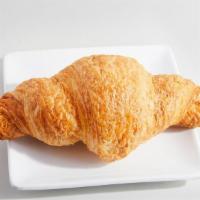 Butter Croissants · Flaky 100% butter croissant baked fresh each morning in our café.