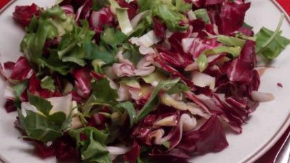 Tri Color Salad · Endive, radicchio, baby arugula, balsamic vinaigrette and shaved Parmigiano.