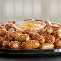 Party Tray - Small Rivet Tray · Pair your small size rivets party tray with any two of our wide assortment of pretzel dips. ...