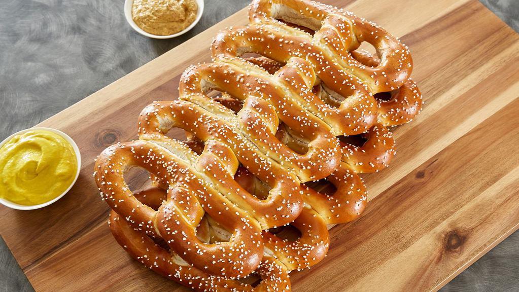 10 Real Pretzels · Hand-twisted. Fresh-baked. Always delicious.