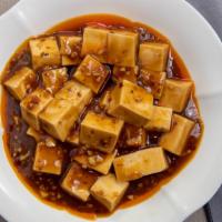 Ma Po Tofu · Minced pork and steamed tofu in spicy sauce.