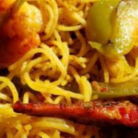 Shrimp Chow Mein · With white rice and crispy noodles.
