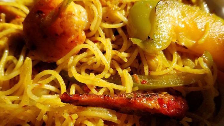 Shrimp Chow Mein · With white rice and crispy noodles.