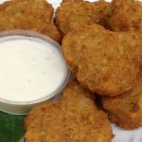 Broccoli & Cheddar Poppers · Broccoli, cheddar cheese & bacon bits, served with Ranch dressing