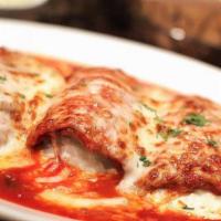 Eggplant Rollantini · Fried eggplant rolled over 3 cheeses topped with tomato sauce and mozzarella cheese.