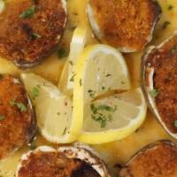 Clams Oreganata · Breadcrumbs, fresh herbs, roasted garlic & brown butter. Served with a lemon & white wine sa...