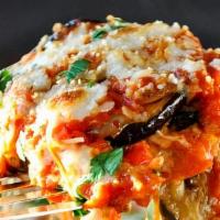 Eggplant Parmigiana - App · Eggplant, mozzarella & fresh basil topped with house tomato sauce & parmigiana cheese