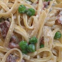 Aldo'S Linguini Carbonara* · Linguini, light cream, parmesan cheese, onions, bacon, egg yolk & green peas
