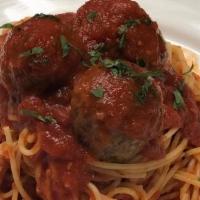 Spaghetti & Meatballs · Spaghetti topped with classic tomato sauce paired with house made beef meatballs