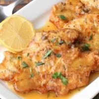 Chicken Francese · flour-dredged, egg-dipped, sautéed chicken cutlets with a lemon-butter and white wine sauce.