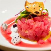 Tuna Tartare · Prickly pear sauce, dragon fruits, crostini.