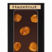 Dark Chocolate Mini Bar - Hazelnut · Kosher, vegan, gluten free. Kosher parve • vegan • gluten-free. 

56% pure dark belgian choc...