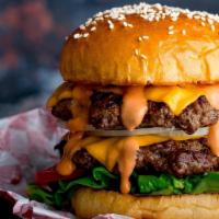 Boss Burger · Six oz smoked angus beef patty, comes with, brioche burger bun, American cheese, lettuce, to...