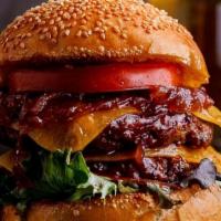 Bourbon-Based Double Cheese  Burger · 8 oz beef patty , lettuce , tomato , pickle , caramelized onions and chipotle sauce