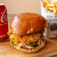 Fried Chicken Burger, Fries & Can Soda · Fried chicken burger comes with French fries and can soda.