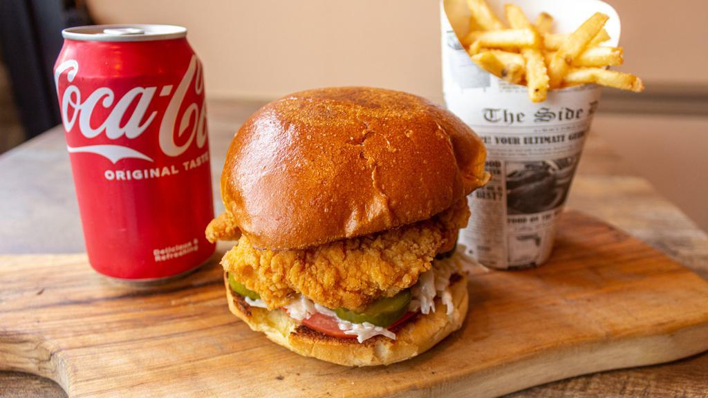 Fried Chicken Burger, Fries & Can Soda · Fried chicken burger comes with French fries and can soda.