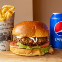 Falafel Burger, Fries & Can Soda · Falafel burger, combo, comes with French fries and can soda.