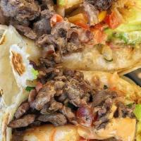 Steak Wrap Combo  · sautéed onions, mushrooms, steak and Swiss cheese Comes with French fries and soda.