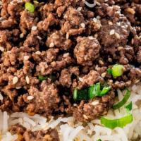 Impossible Vegan Bowl  · Plant-based, rice, guacamole, shredded lettuce, black beans, and vegan sauce.