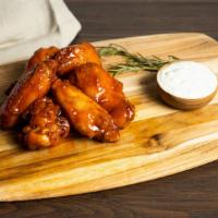 Champs Box · Six jumbo wings fried till' perfection with your choice of sauce served with fries.
