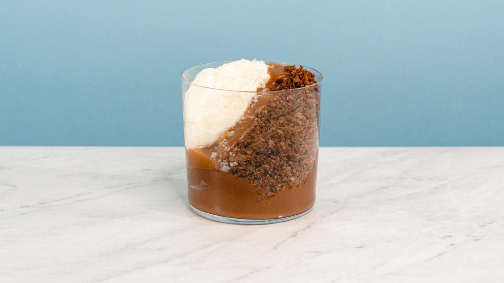 Salt Of The Earth Pud · This pud is perfect combination of salty and sweet. Enjoy a rich chocolate pudding with malted whipped cream and a salty potato crunch | Allergen: Milk, Egg,
