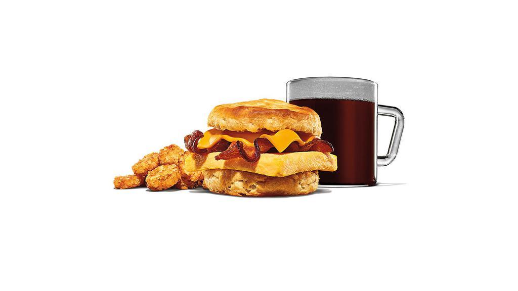 Bacon, Egg & Cheese Biscuit Meal · Rise and shine with our Bacon, Egg & Cheese Biscuit. Thick cut naturally smoked bacon, eggs, and American cheese are layered between one of our buttermilk biscuits. Meal comes in medium and large sizes. Served with Hash Browns, your choice of Drink