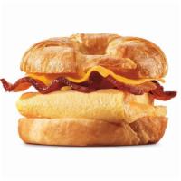Bacon, Egg & Cheese Croissan Wich® · Our grab-and-go Bacon, Egg & Cheese CROISSAN’WICH® is now made with 100% butter for a soft, ...