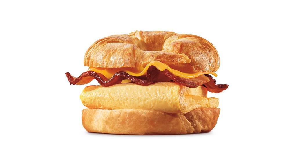 Bacon, Egg & Cheese Croissan Wich® · Our grab-and-go Bacon, Egg & Cheese CROISSAN’WICH® is now made with 100% butter for a soft, flaky croissant piled high with thick cut naturally smoked bacon, fluffy eggs, and melted American cheese.